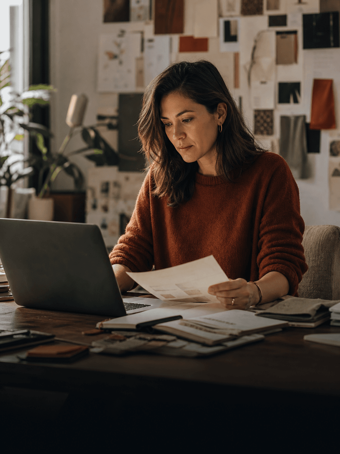 An independent strategist reviewing consumer research at a laptop